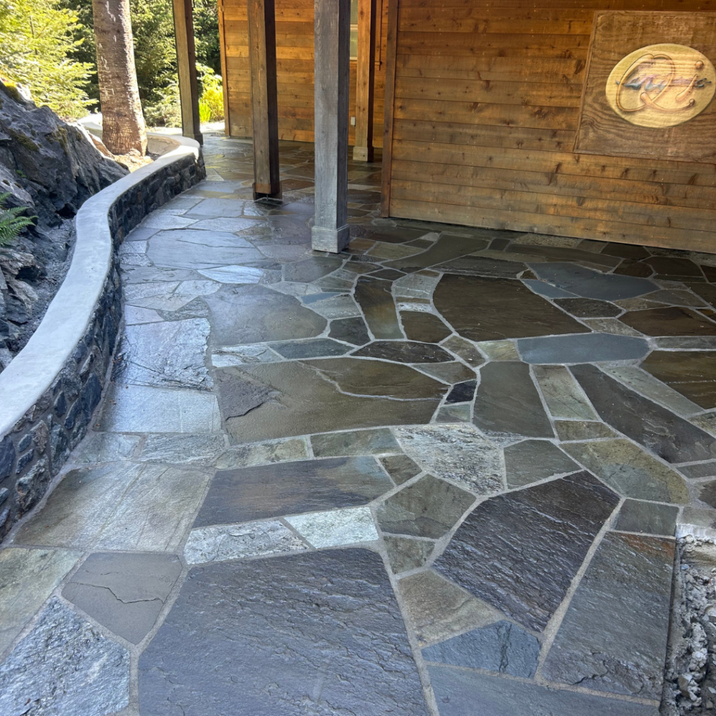 Flagstone patio and natural stone walls